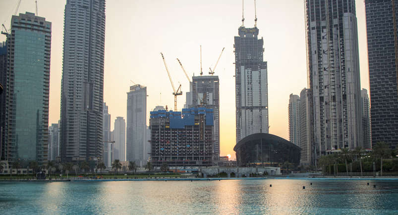 Dubai off plan property opportunities with the Dubai skyline and modern residential developments in 2026.