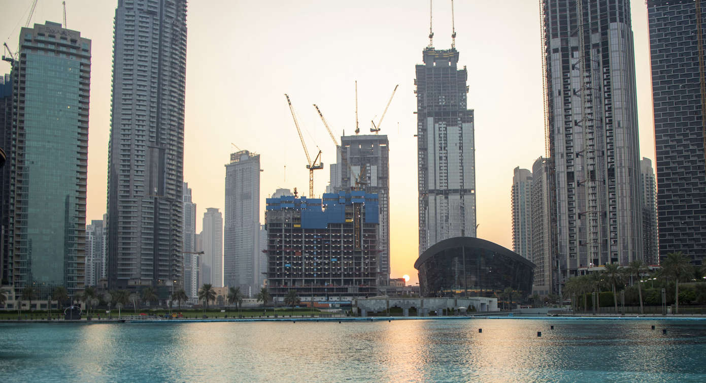 Dubai off plan property opportunities with the Dubai skyline and modern residential developments in 2026.